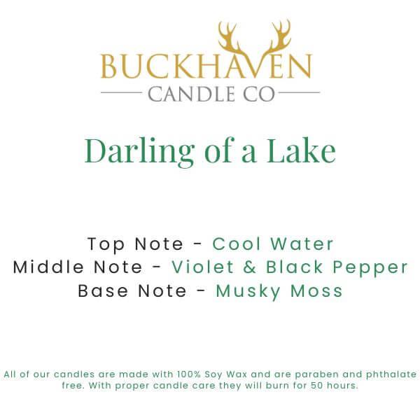 Scent card for Darling of a Lake candle with cool water, violet, black pepper, musky moss notes